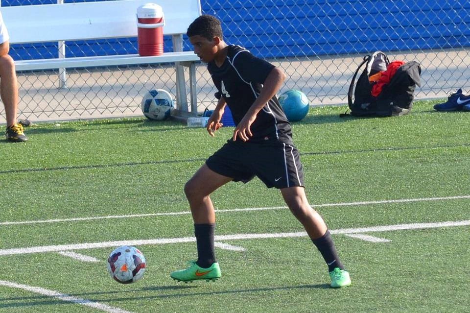 PHS student athlete playing soccer