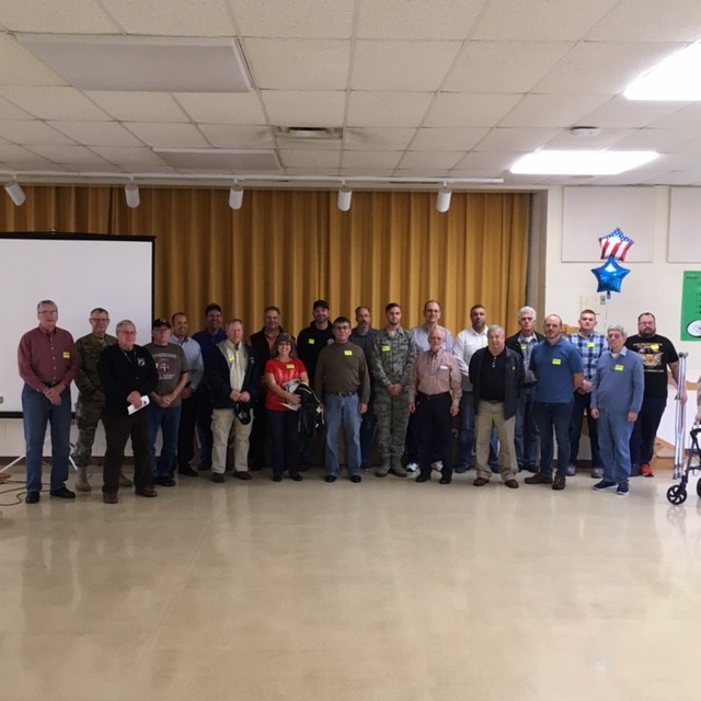 Large group photo of participants in Veterans Day program 2016
