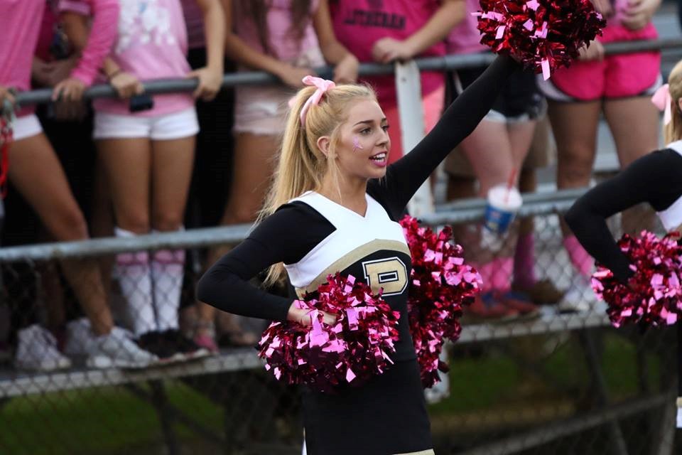PHS cheerleader performing at a game