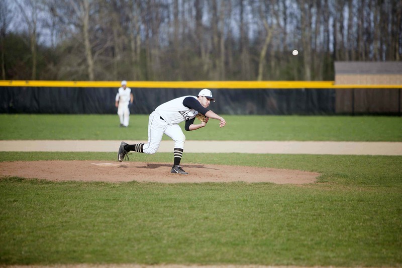 Student athlete pitching