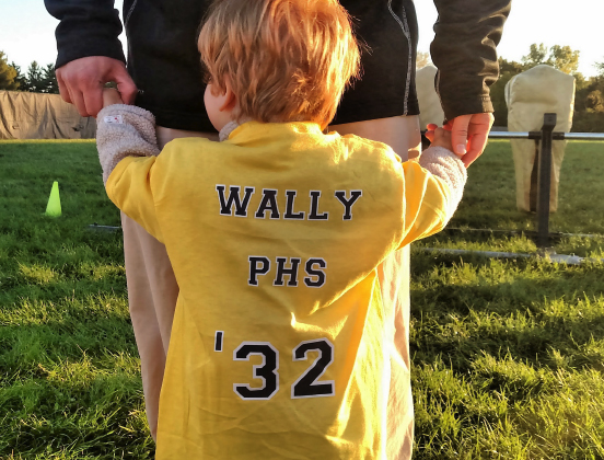 Preschool student with shirt that says "Wally PHS &#39;32"