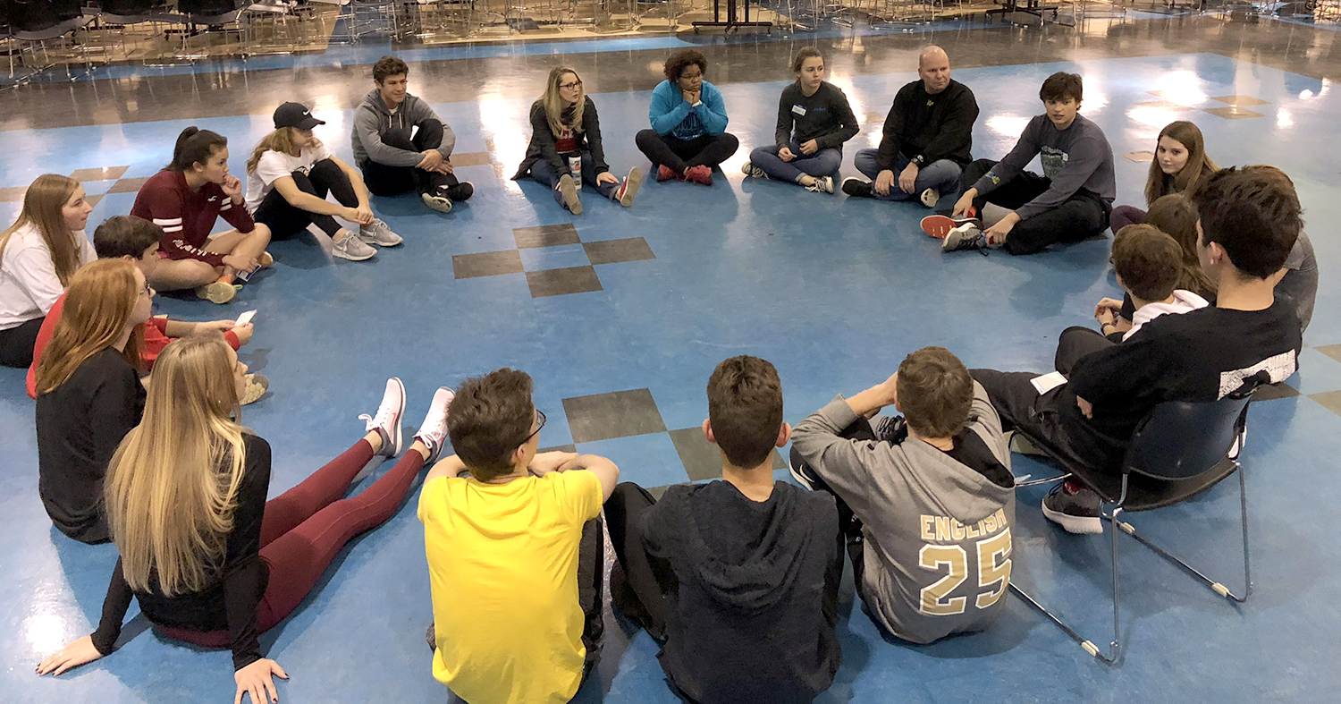 Members of Perrysburg High School Student Council sitting and talking in a circle