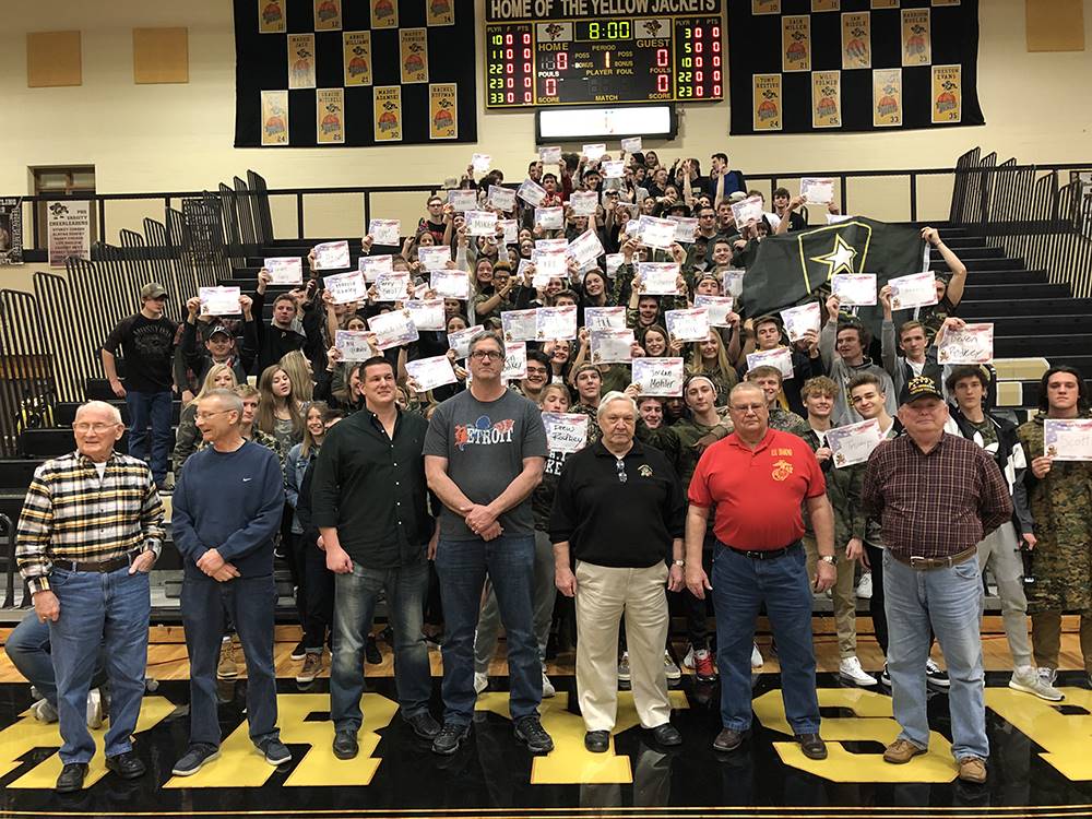 recognition of 7 veterans with a crowd of students