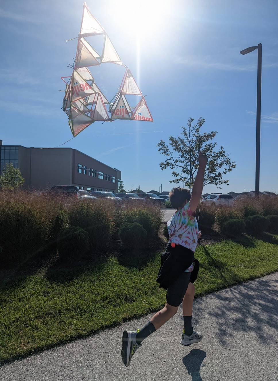 Student flying kite