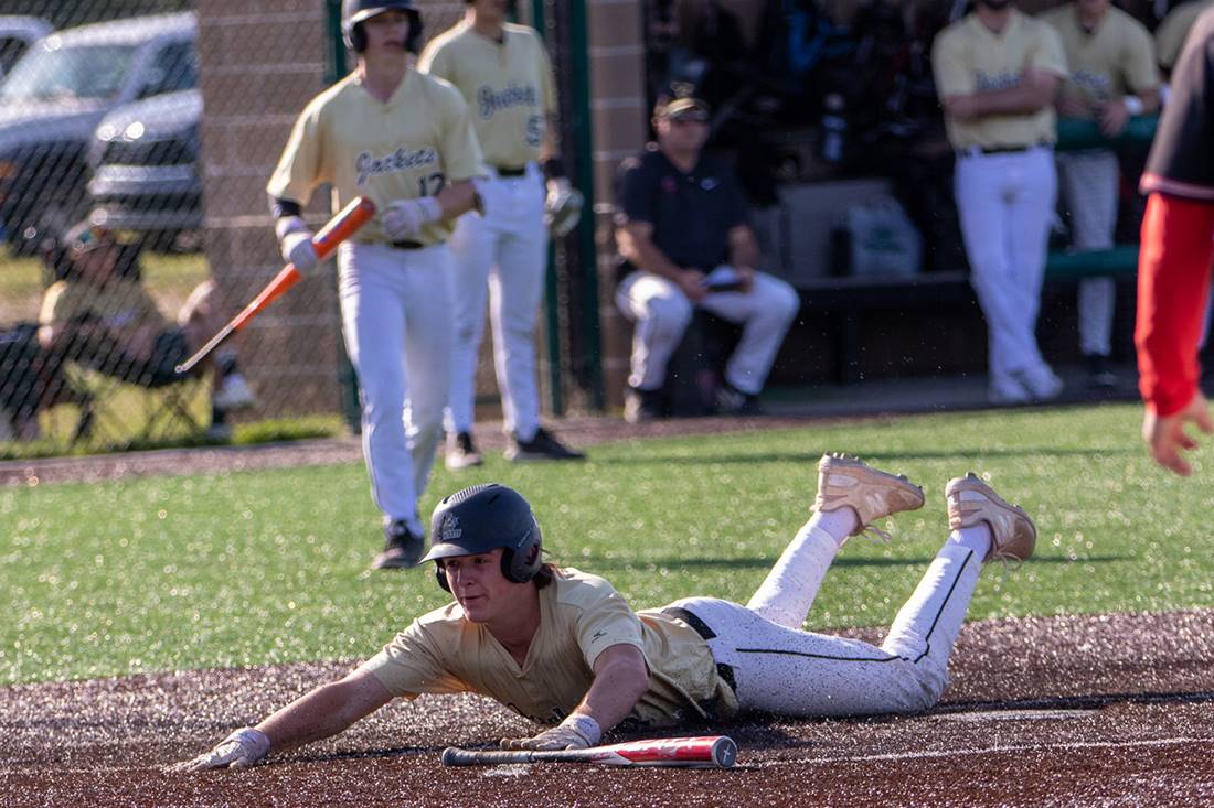 students playing baseball