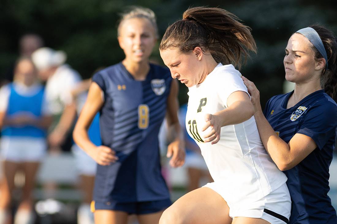 students playing soccer