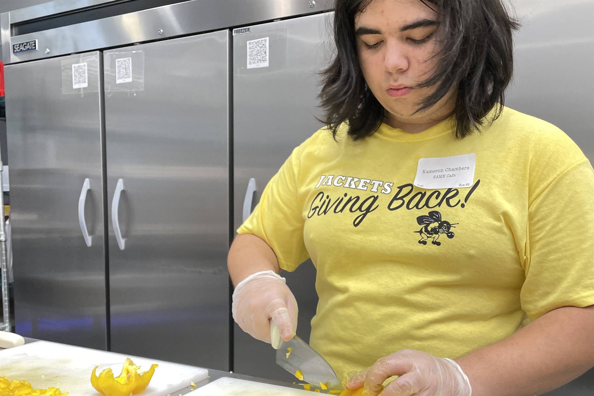 student preparing food